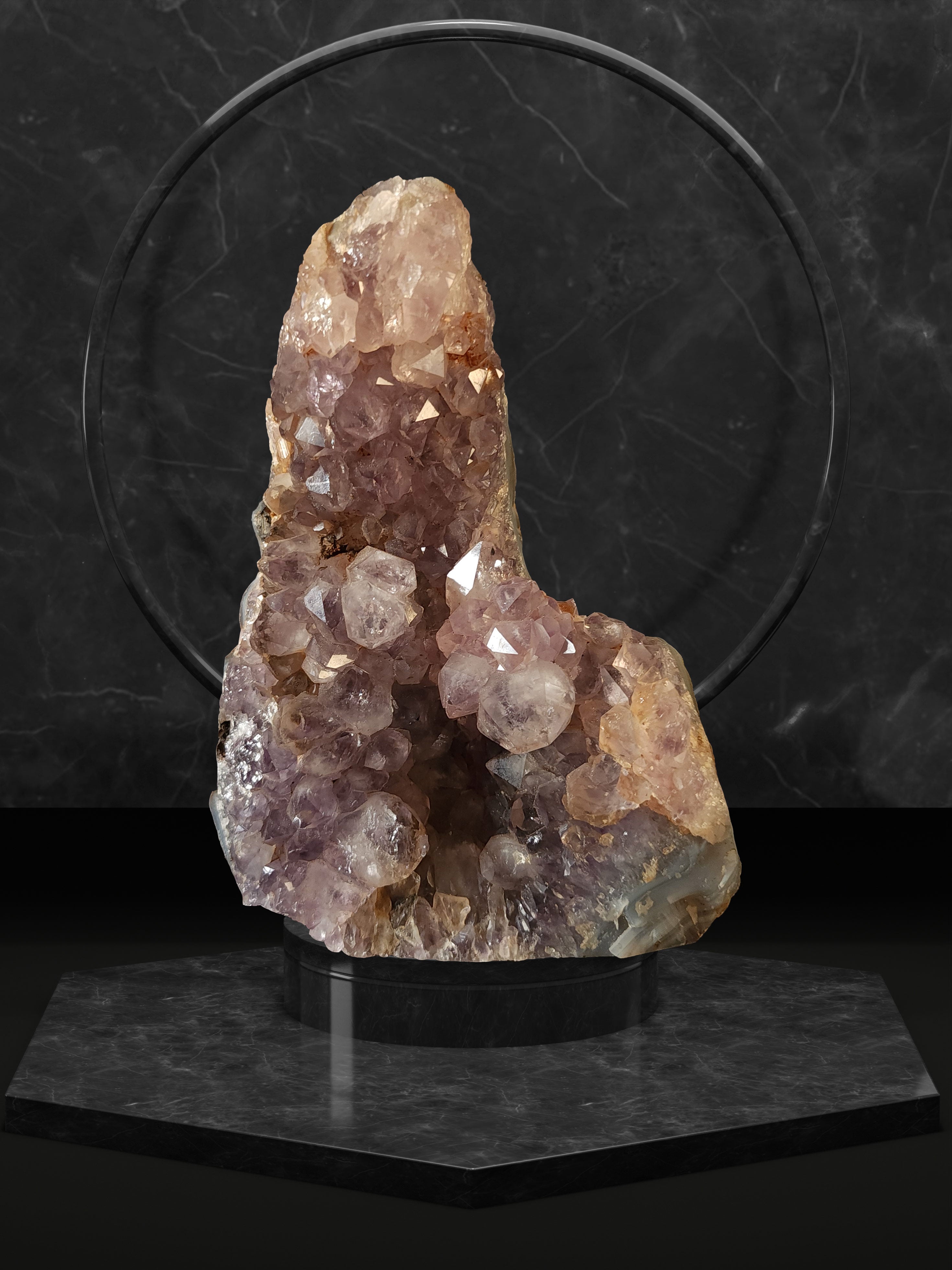 Beautiful Amtethyst from Brazil with purple and pink hue. This amethyst is shaped like a mini-cathedral, perfect for a desk or tabletop.