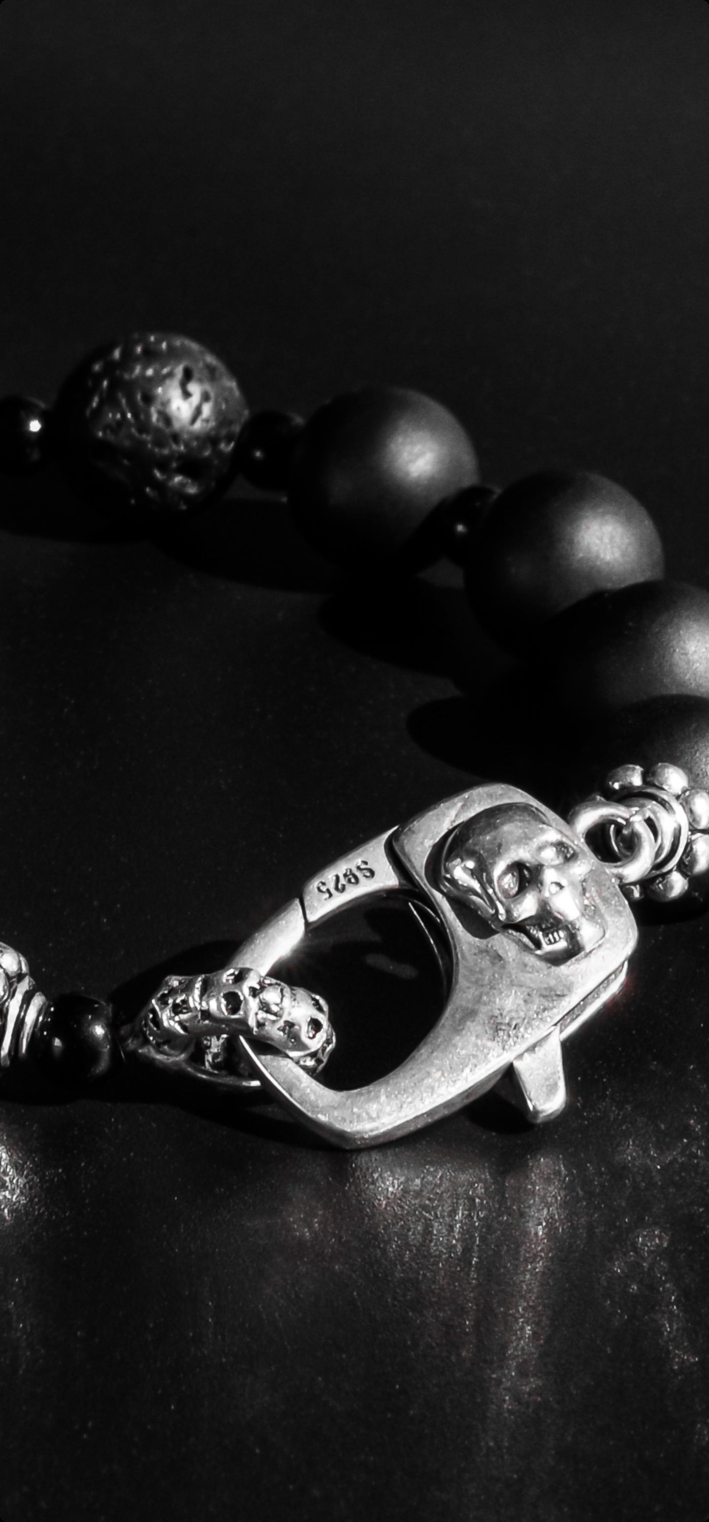 RIVER STYX COLLECTION - MATTE BLACK ONYX AND LAVA STONE BRACELET WITH SILVER SKULL CLASP