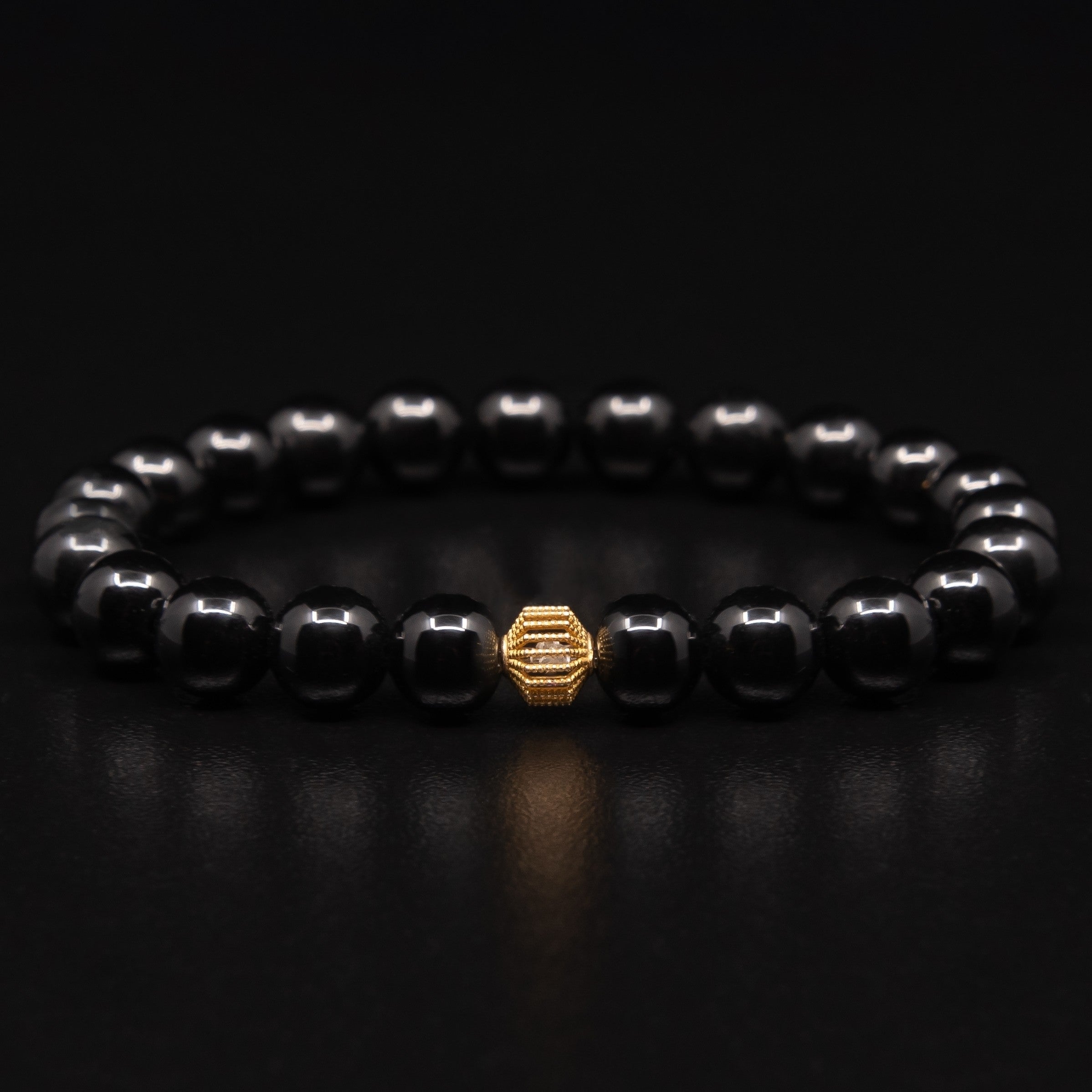 POLISHED BLACK ONYX BRACELET WITH 18K GOLD